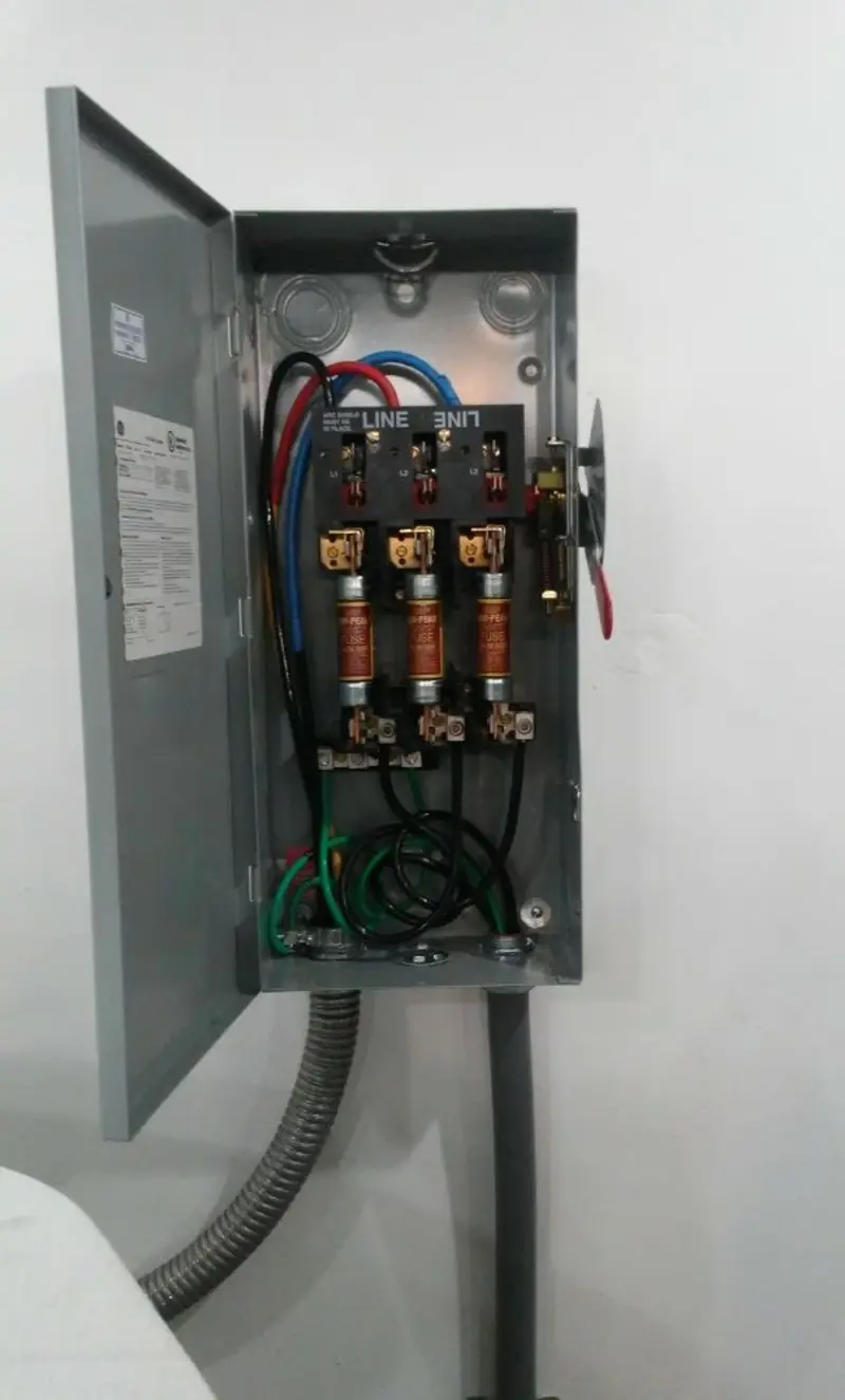 Three-phase disconnect switch installed for Smoke Detector Installation in Cheval